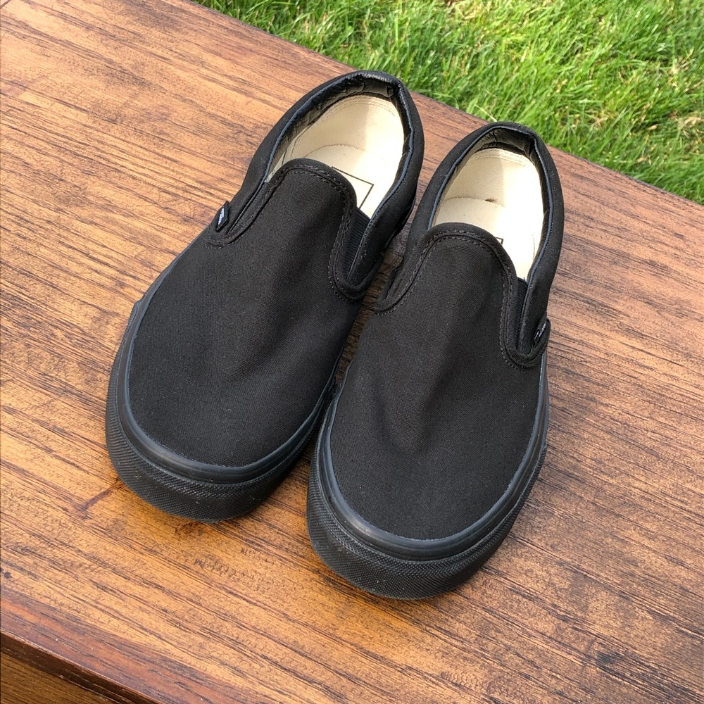 Black Vans Classic Slip on shoes